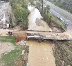 Main bridge access into the facility that was heavily damaged by the flooding. Photo by Aerial Lens.