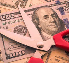 money cost cutting Medicare scissors dollar economics