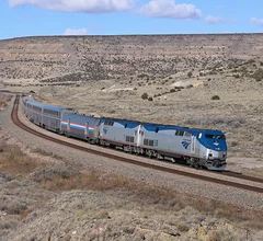 Amtrak eastbound Southwest Chief about to pass under Route 66