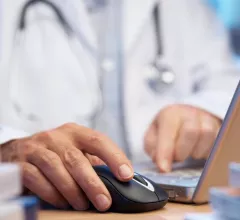 physician using EHR system