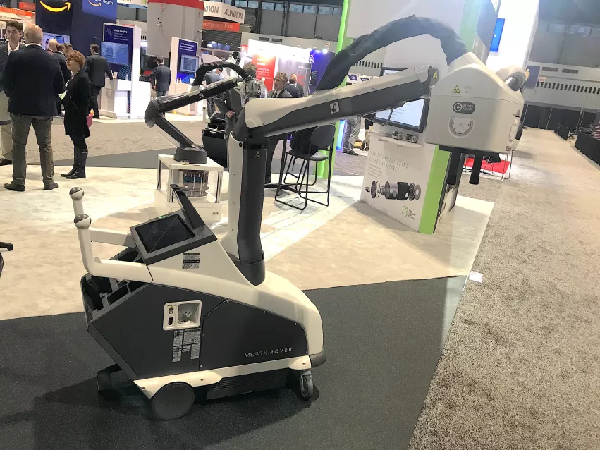 FDA-cleared, cold-cathode mobile DR X-ray system at RSNA 2022. The Micro-X Rover uses carbon nanotubes rather than the standard filaments used in X-ray tubes for the past century. The nano tubes produce an electron beam in the tube without producing heat, which is the majority of the energy released in standard tubes. This eliminates the need for cooling systems, the related structural metal supports and motorized drive system because of a massive weight reduction.