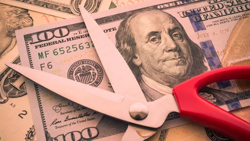 money cost cutting Medicare scissors dollar economics