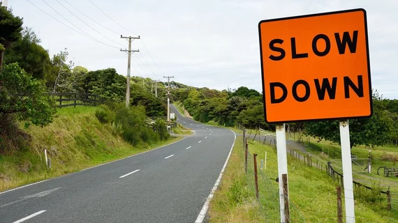 slow down sign