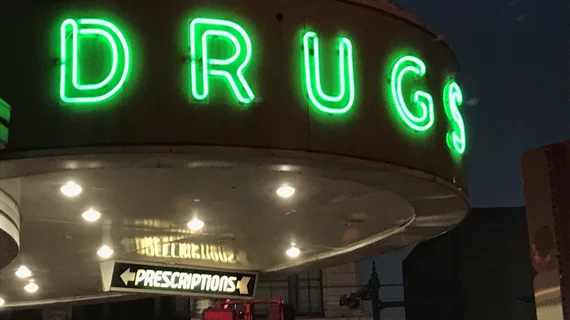 Vintage neon drug sign at the Walgreens pharmacy on Canal Street in downtown New Orleans.