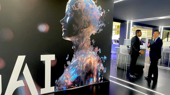 Artificial intelligence sign in the United Imaging booth. The Chinese company wants to break into the U.S. market and has a massive booth footprint at RSNA 2023. This included a section for its own AI development division. Photo by Dave Fornell #RSNA