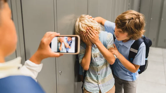 Adolescent schoolkid bullying kids