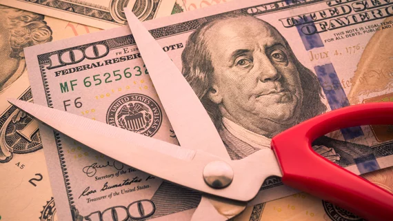 money cost cutting Medicare scissors dollar economics