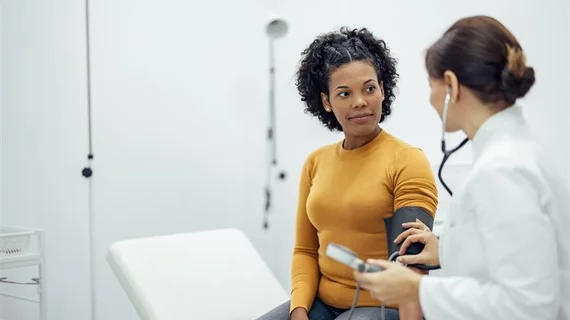 female patient speaking with a doctor