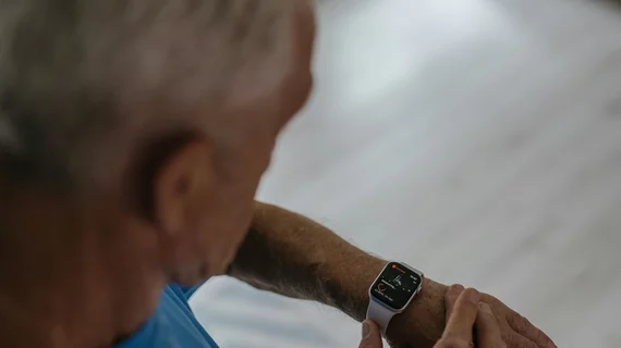 older guy with smartwatch